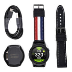 Contents within the GOLFBUDDY aim W11 including straps, cable, charger, and watch
